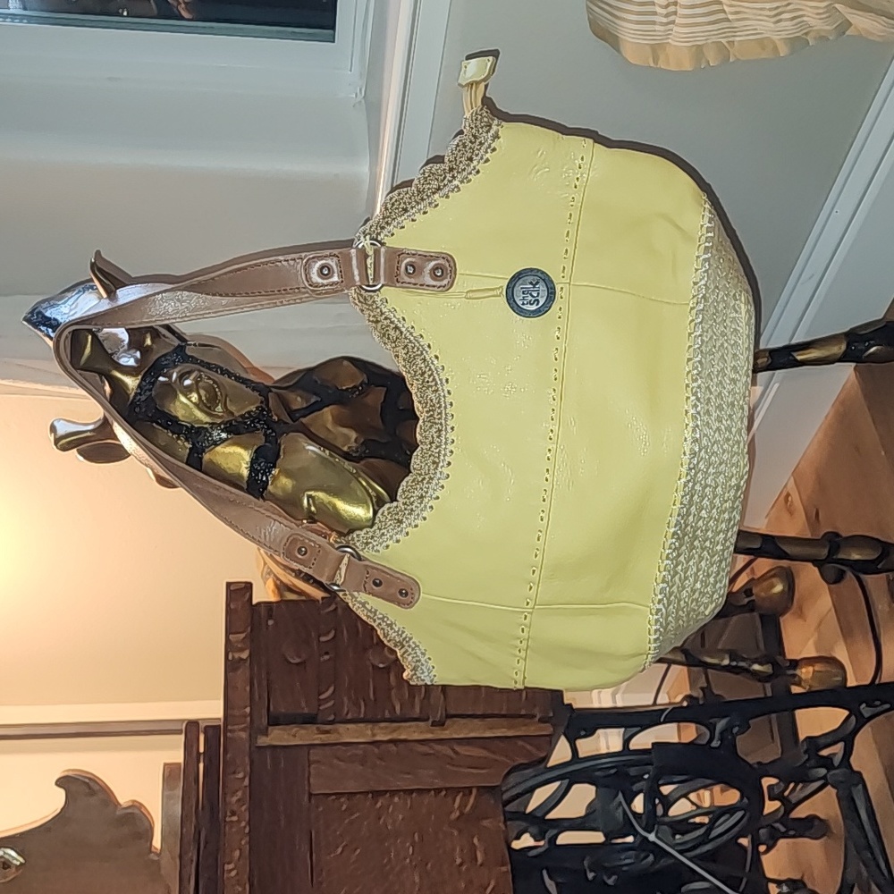 the sak. Shoulder bag. Yellow leather with jute stitching. Super cute